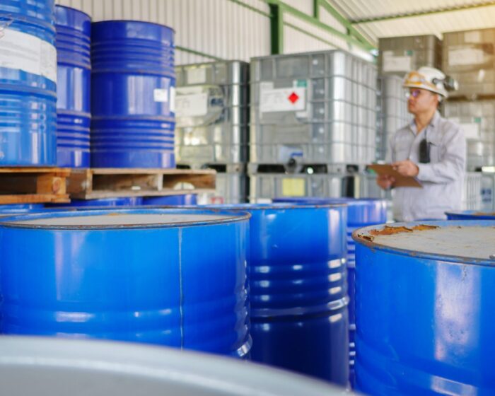 a man analyzing chemical tanks