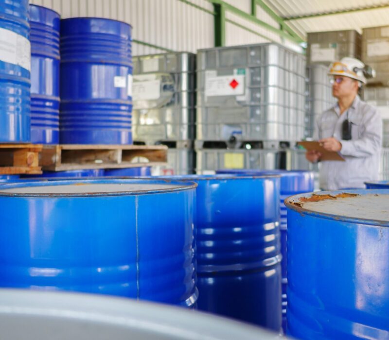 a man analyzing chemical tanks